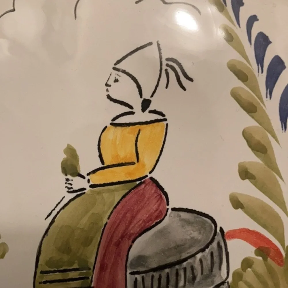 Sur La Table Quimper 10” wall decor plate made in Portugal- sitting woman